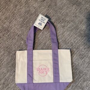 Trader Joe’s mini pastel purple and cream tote